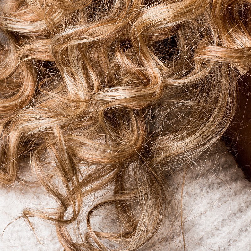 Understanding Hair Changes with Age: Causes & Solutions