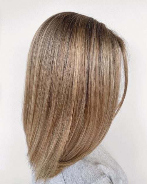 Medium Blonde Hair Color: 26 Trending Shades for 2024 | [Your Brand/Website Name]