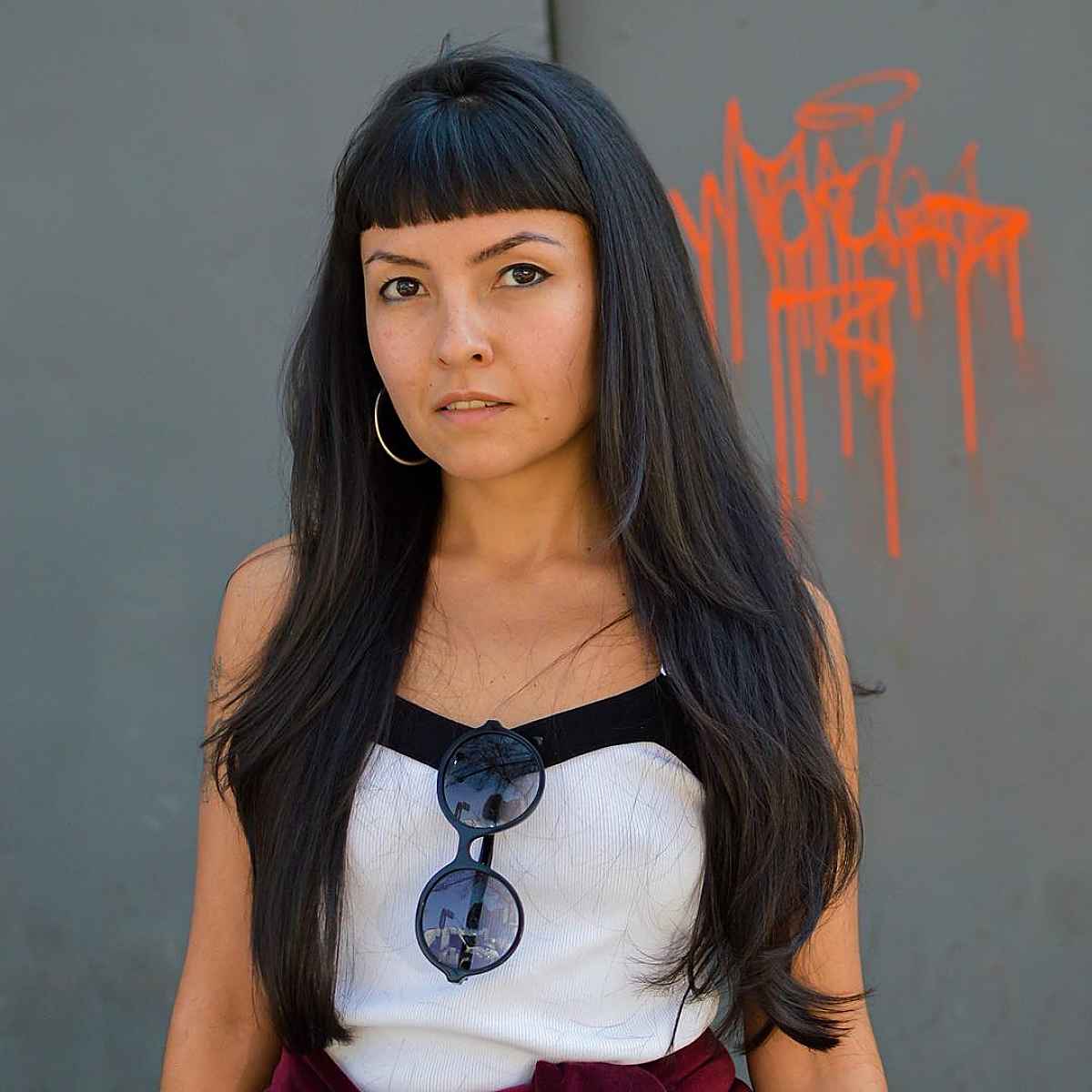 Long Layered Hair with Bangs: 2022 Trends & Styling Tips