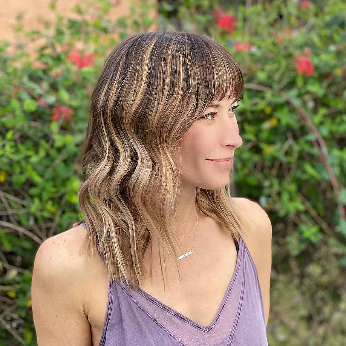 Wavy Hair with Bangs: 26 Flattering Styles & Styling Tips