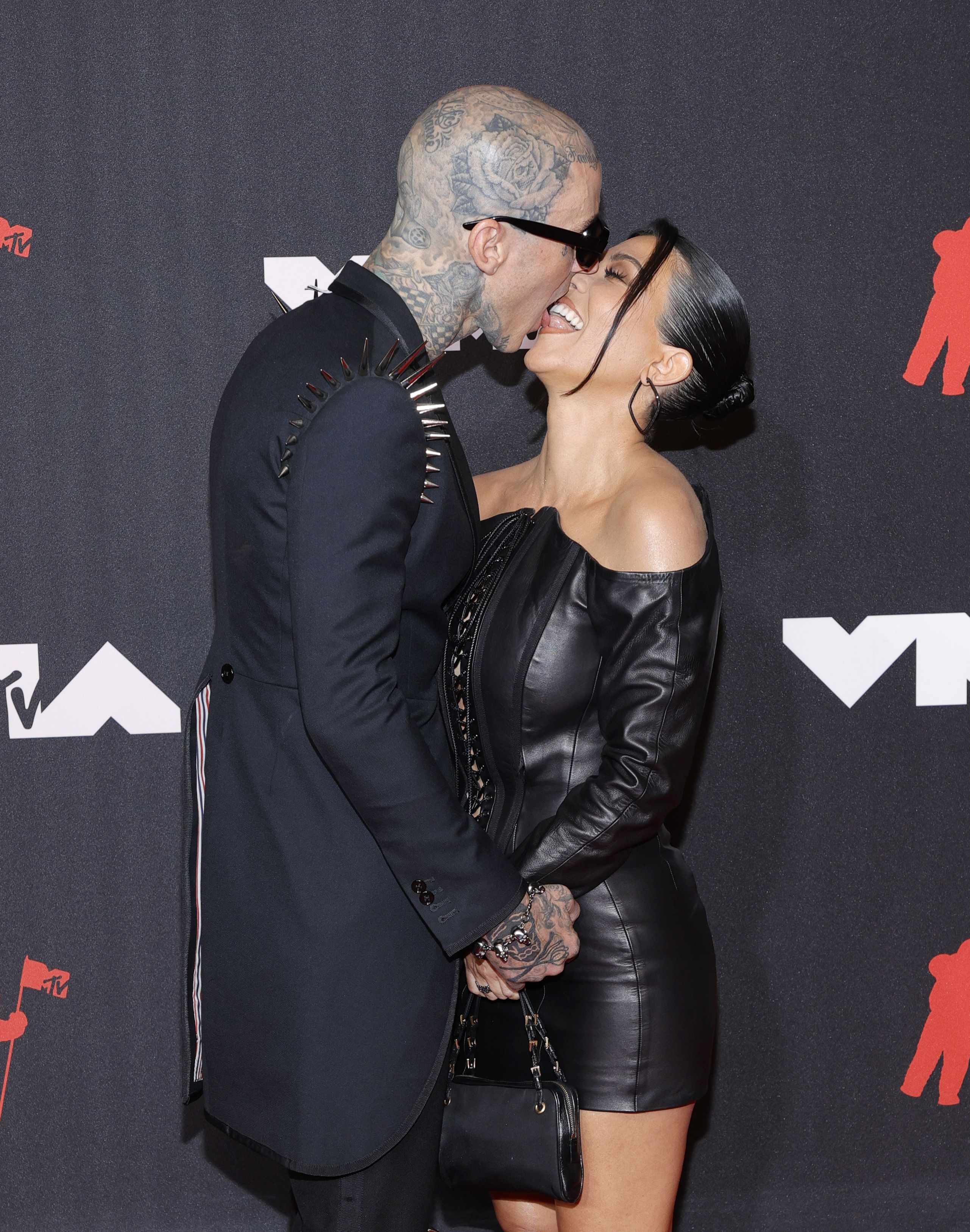 Kourtney Kardashian & Travis Barker: A Timeline of Their Relationship