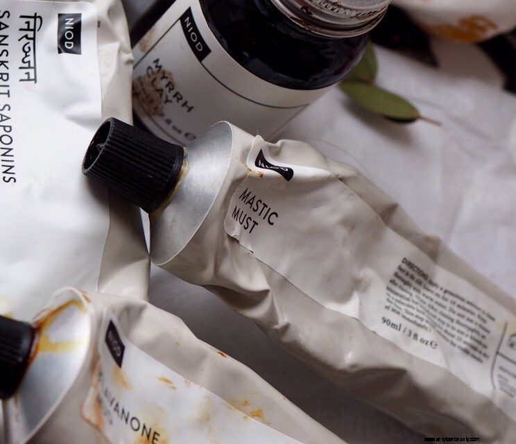 NIOD Mask Comparison: Flavanone Mud vs. Myrrh Clay - Which is Best for You?