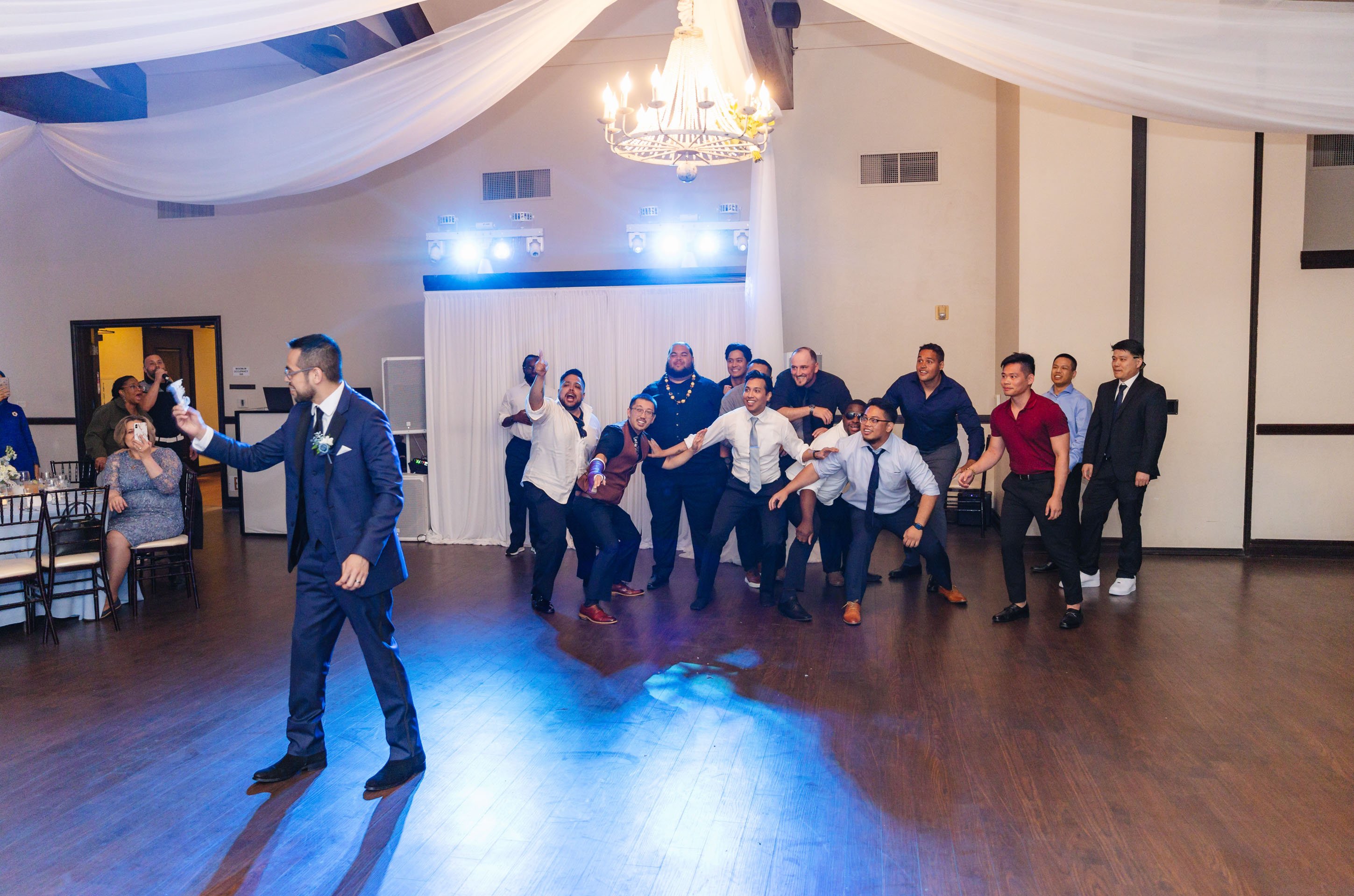 The Garter Toss: Meaning, History & Should You Include It?