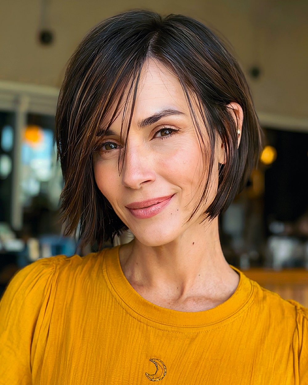 Best Short Haircuts with Bangs for Women Over 40 | Expert Guide