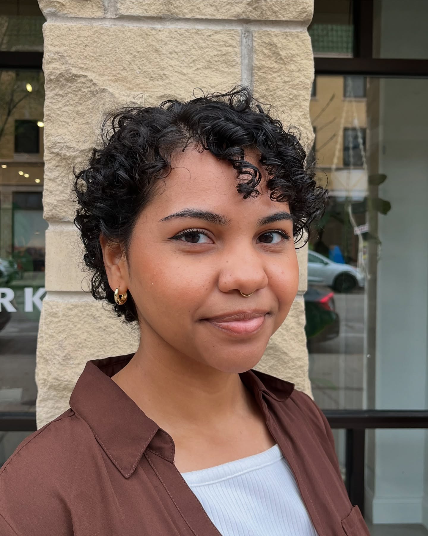 Best Short Curly Haircuts for Round Faces in 2026 | Expert Styles