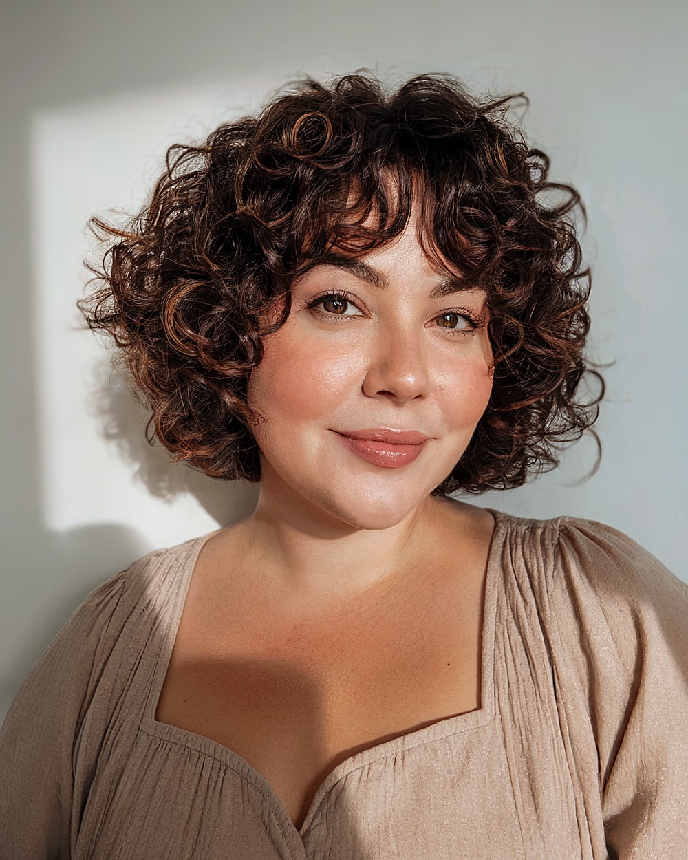 Best Short Curly Haircuts for Round Faces in 2026 | Expert Styles