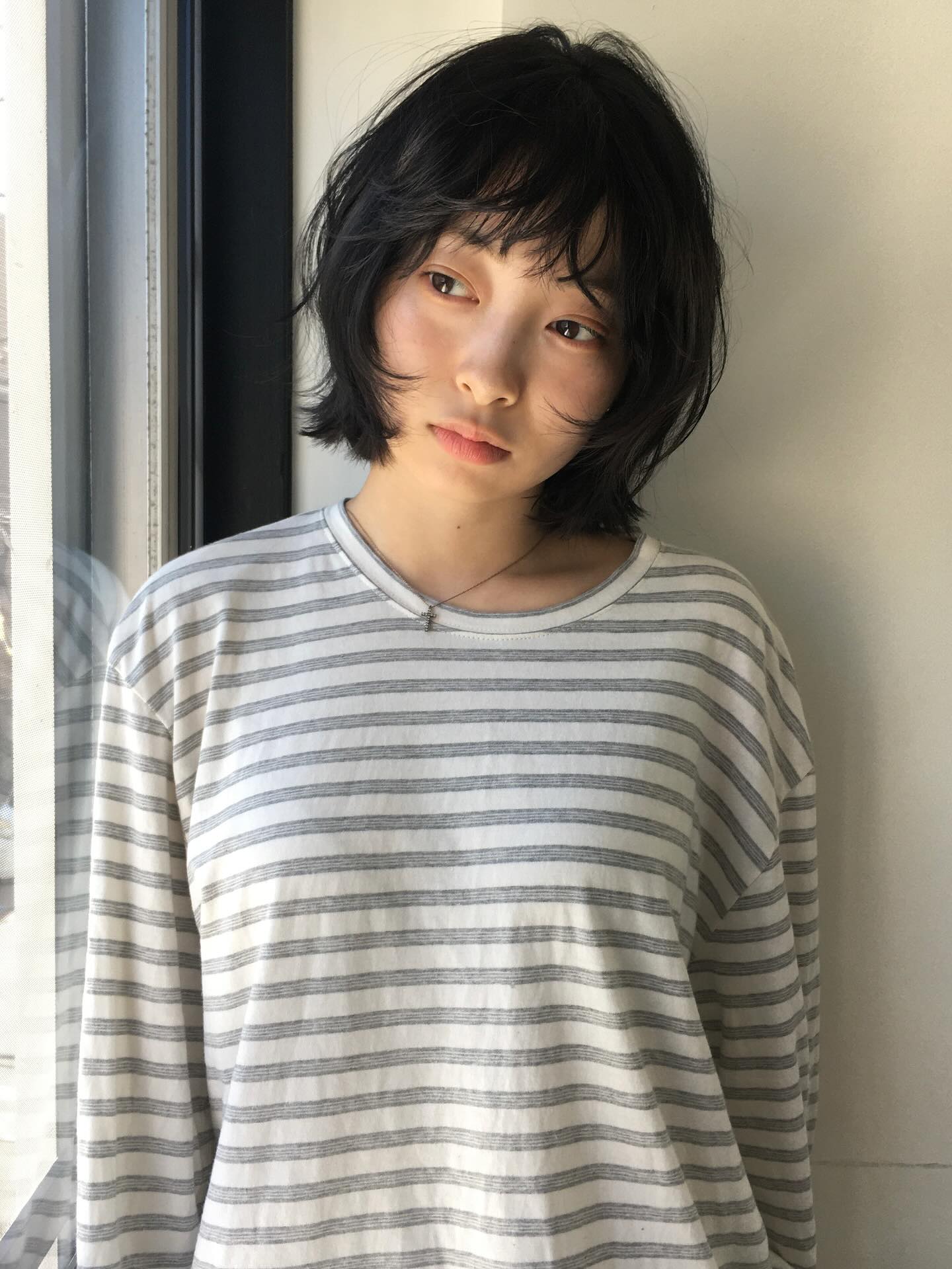 Best Short Haircuts for Round Faces: Styles & Tips
