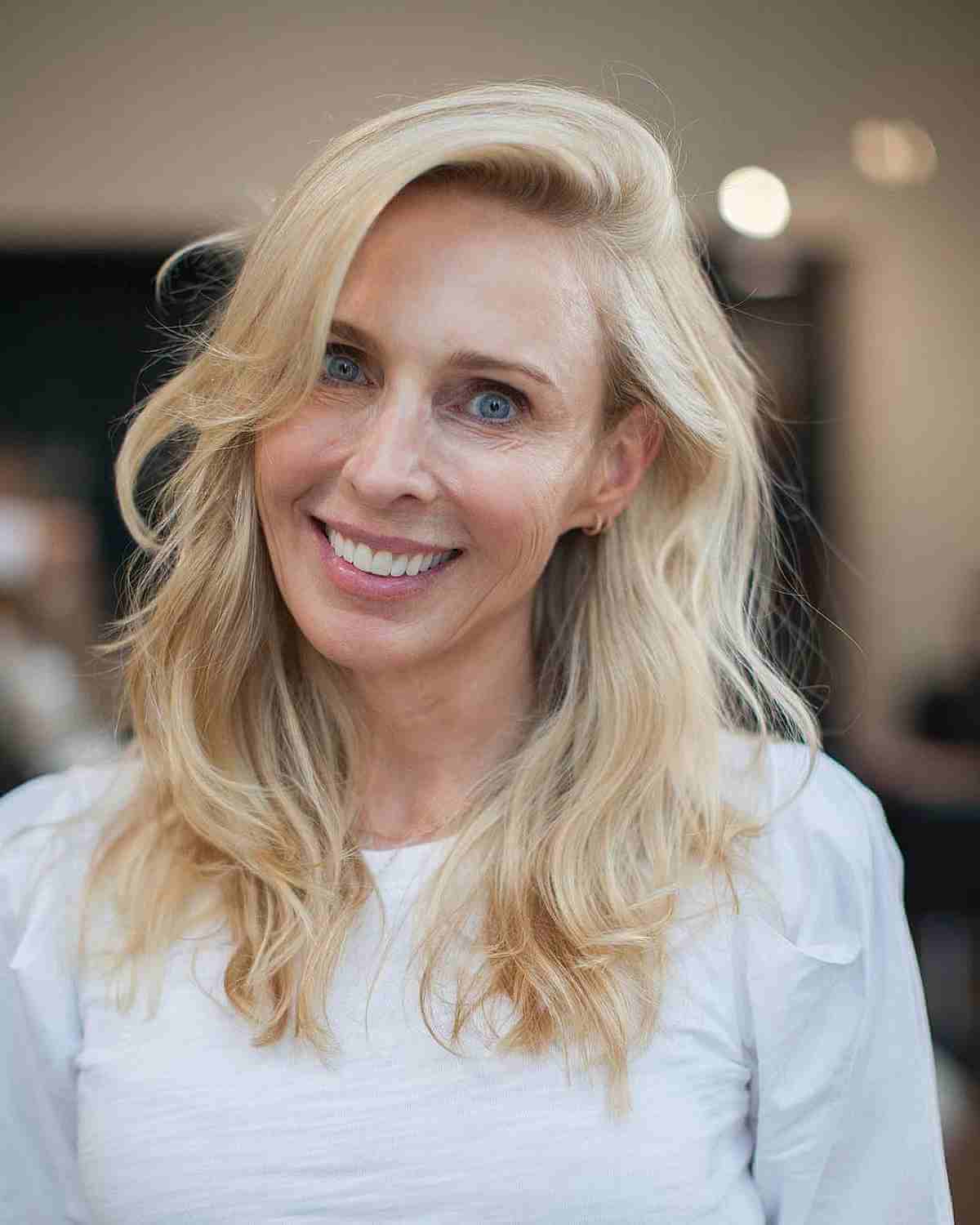 Medium Layered Haircuts with Side-Swept Bangs: Style & Versatility