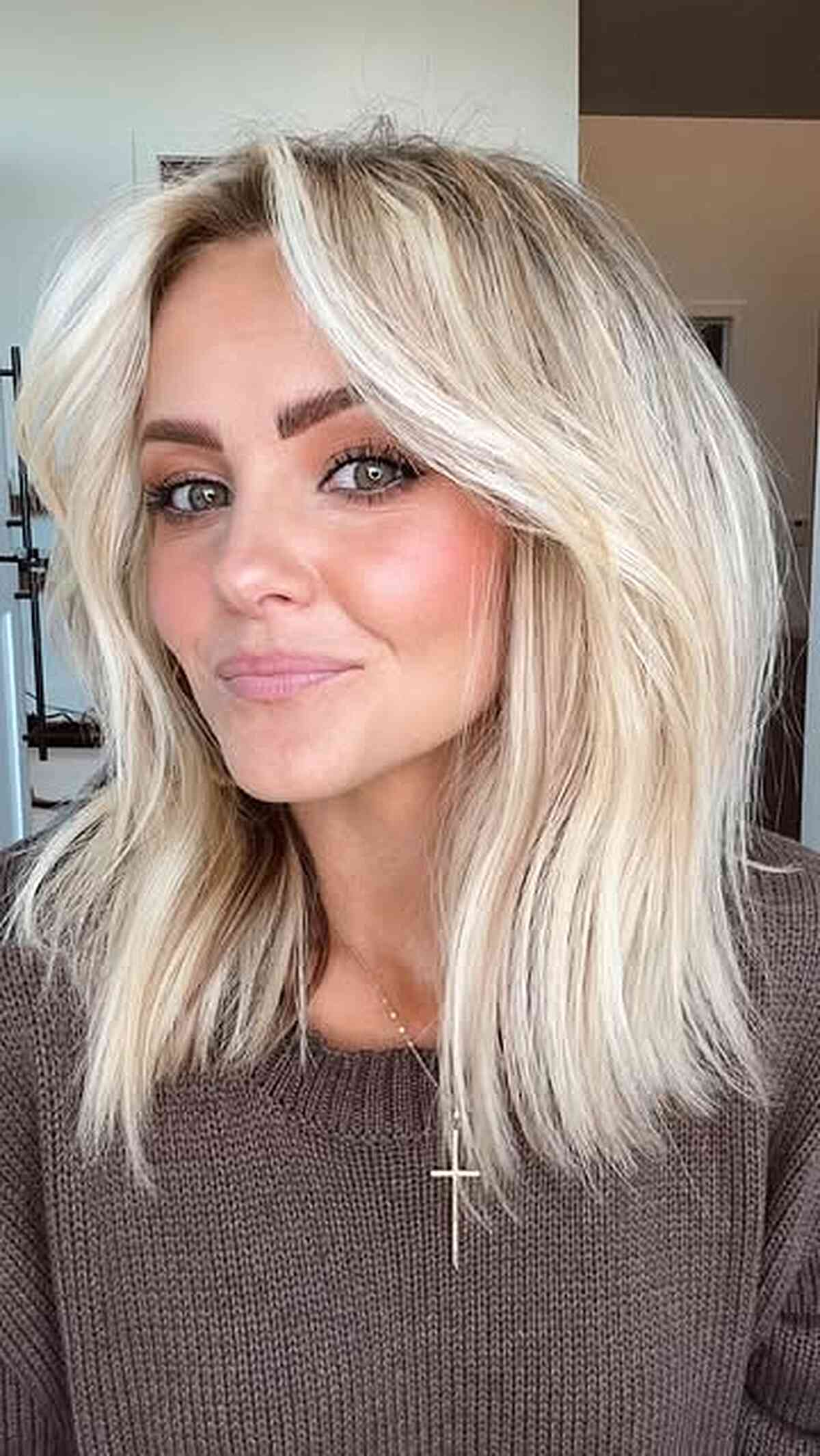Shoulder-Length Hair with Curtain Bangs: Styles & Styling Tips