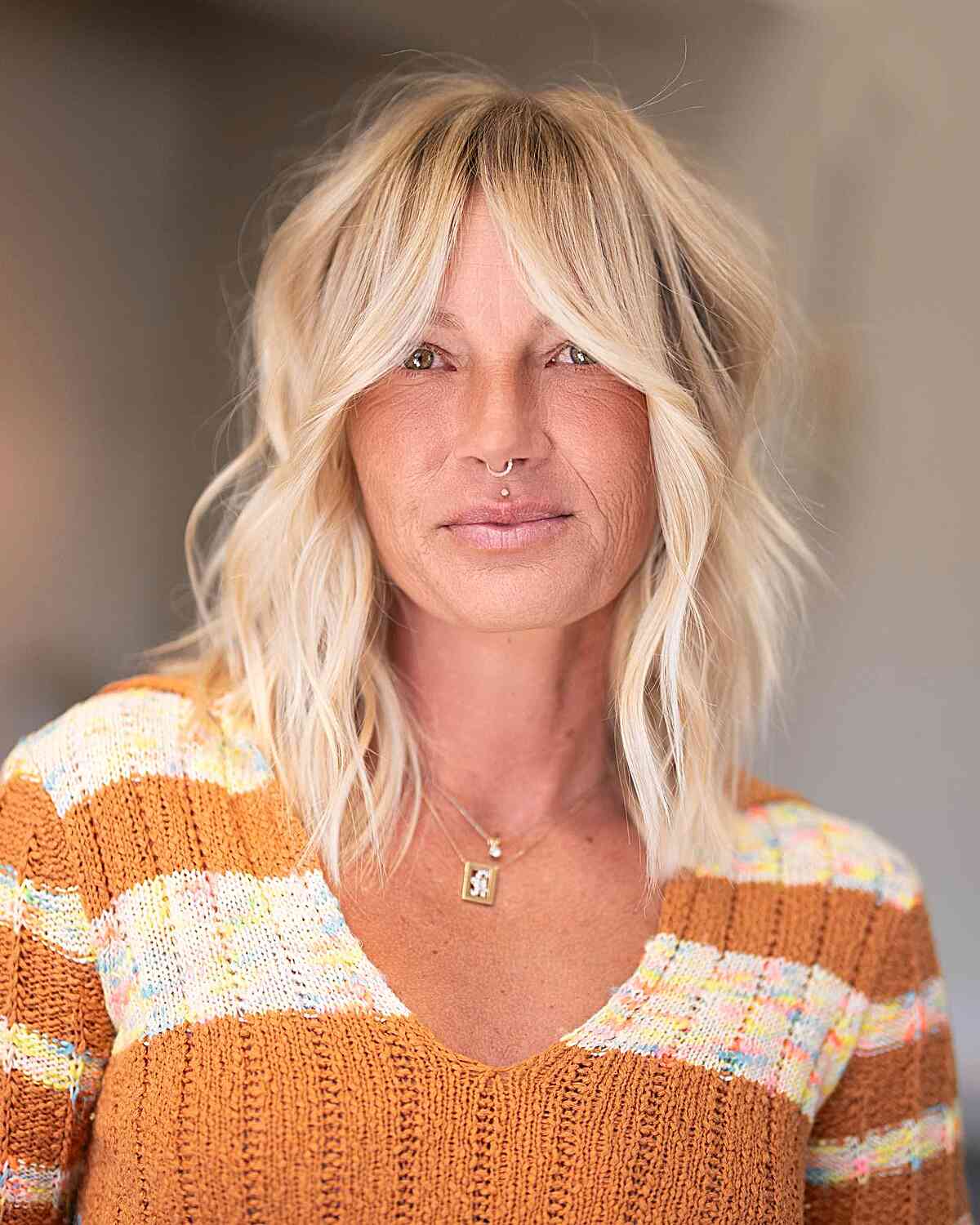 Shoulder-Length Hair with Curtain Bangs: Styles & Styling Tips