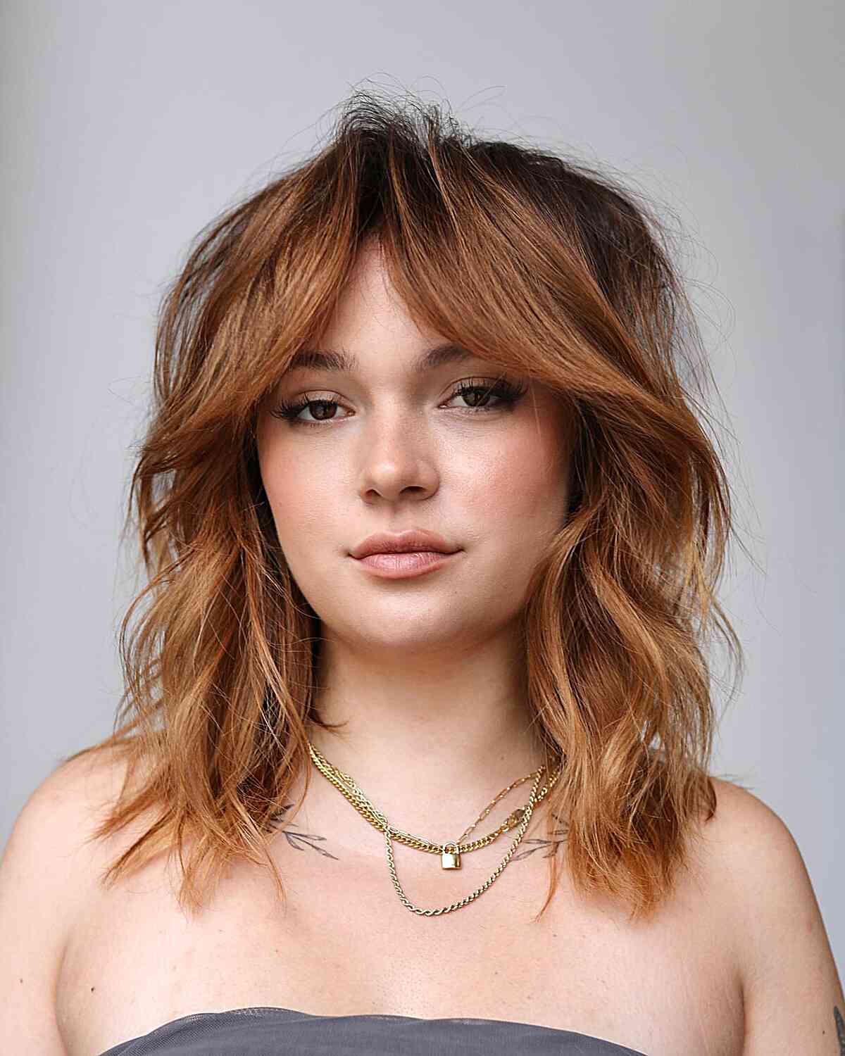 Shoulder-Length Hair with Curtain Bangs: Styles & Styling Tips