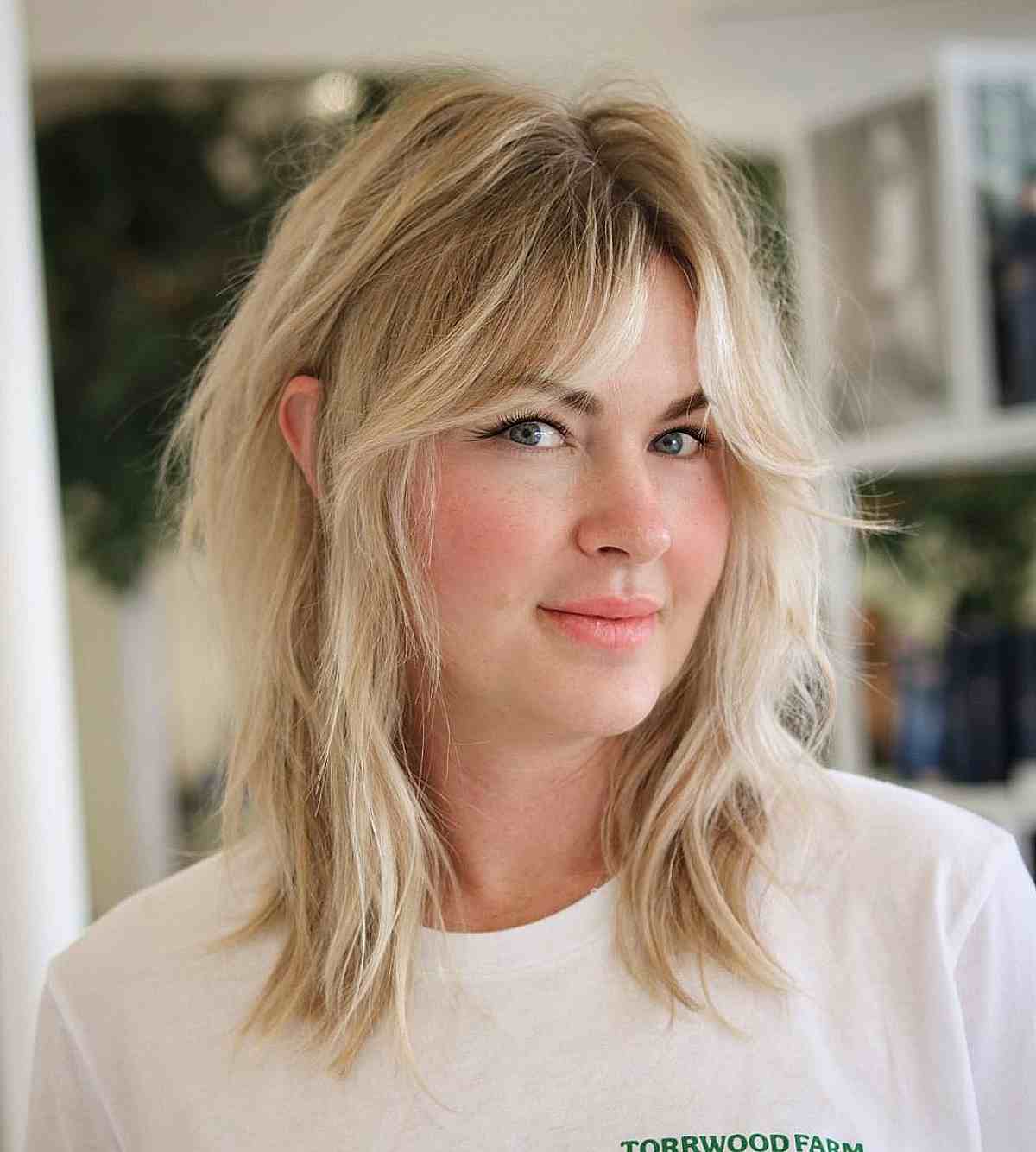 Shoulder-Length Hair with Curtain Bangs: Styles & Styling Tips