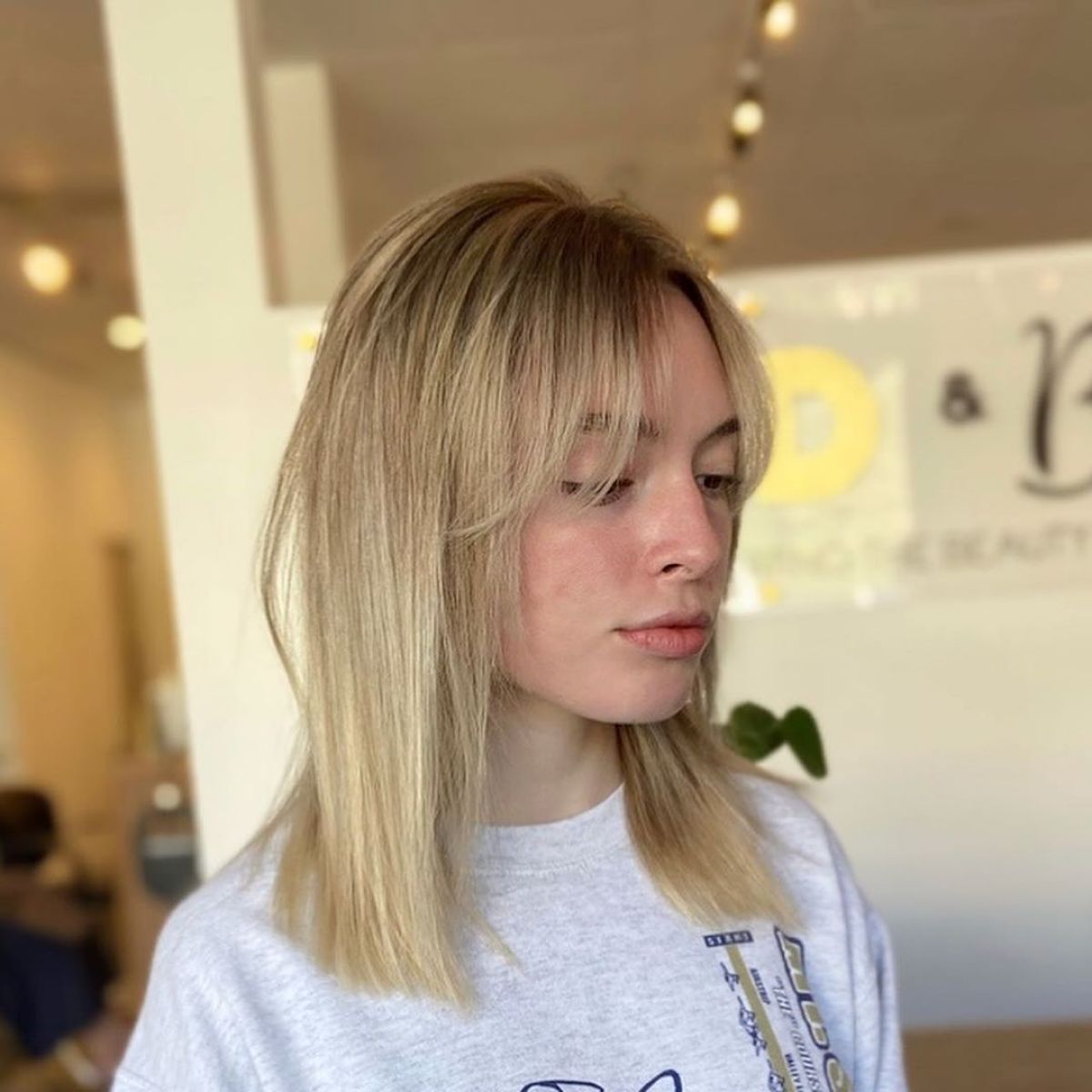 Shoulder-Length Hair with Curtain Bangs: Styles & Styling Tips