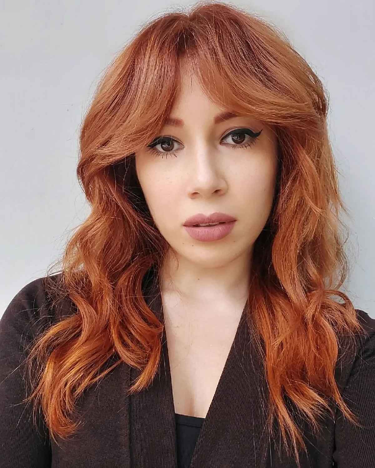 Shoulder-Length Hair with Curtain Bangs: Styles & Styling Tips