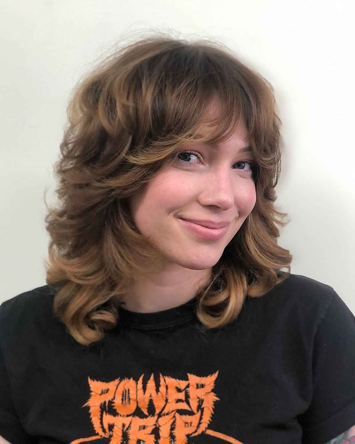 Shoulder-Length Hair with Curtain Bangs: Styles & Styling Tips