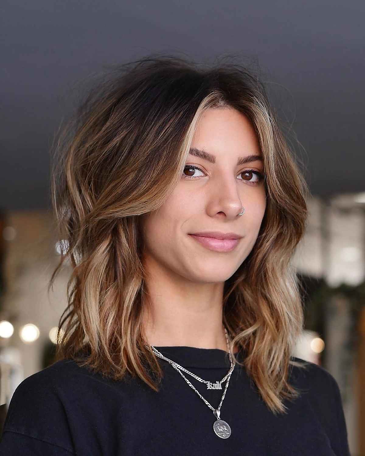 Shoulder-Length Hair with Curtain Bangs: Styles & Styling Tips