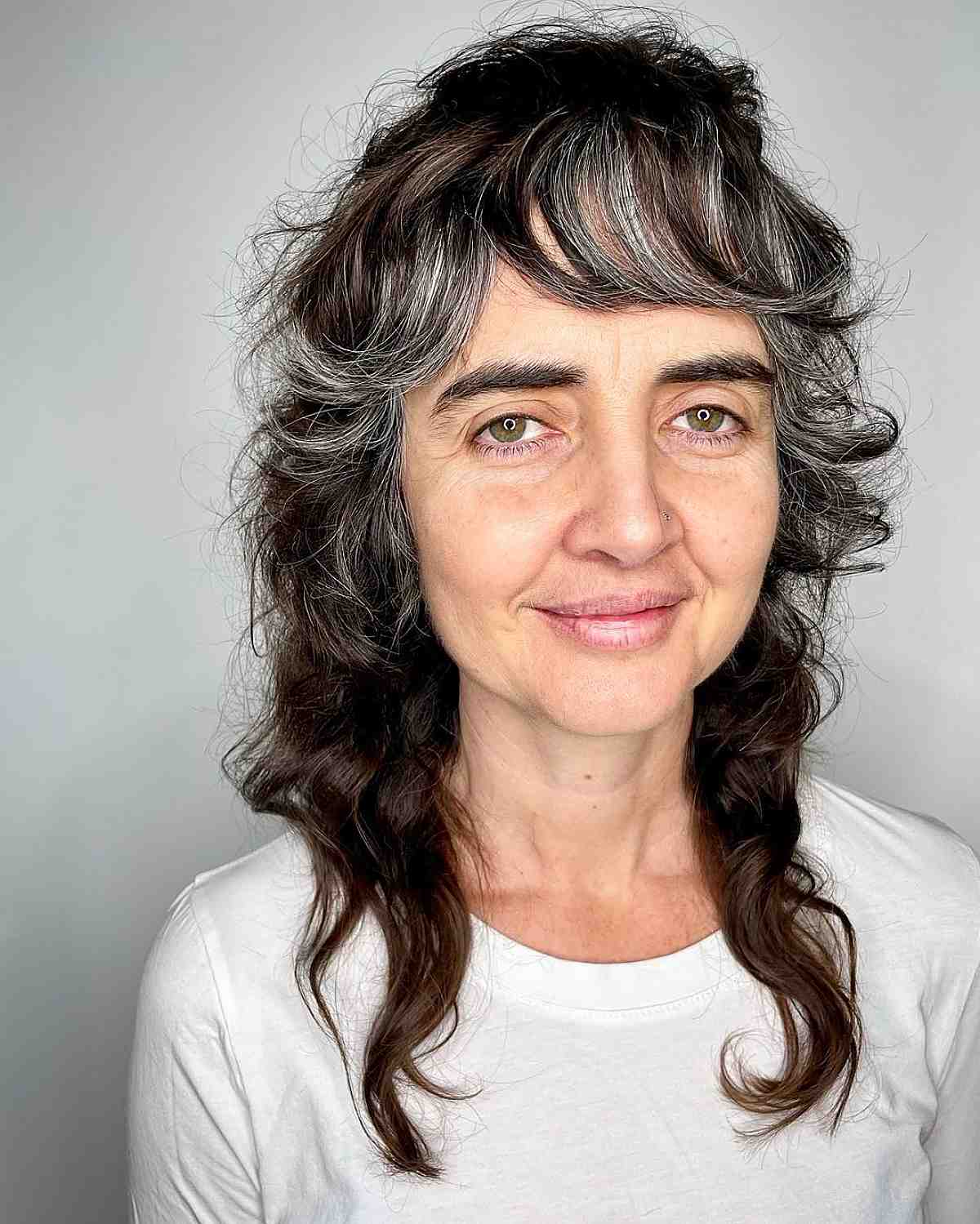 Stylish Medium Shaggy Hairstyles for Women Over 60 | [Your Brand]