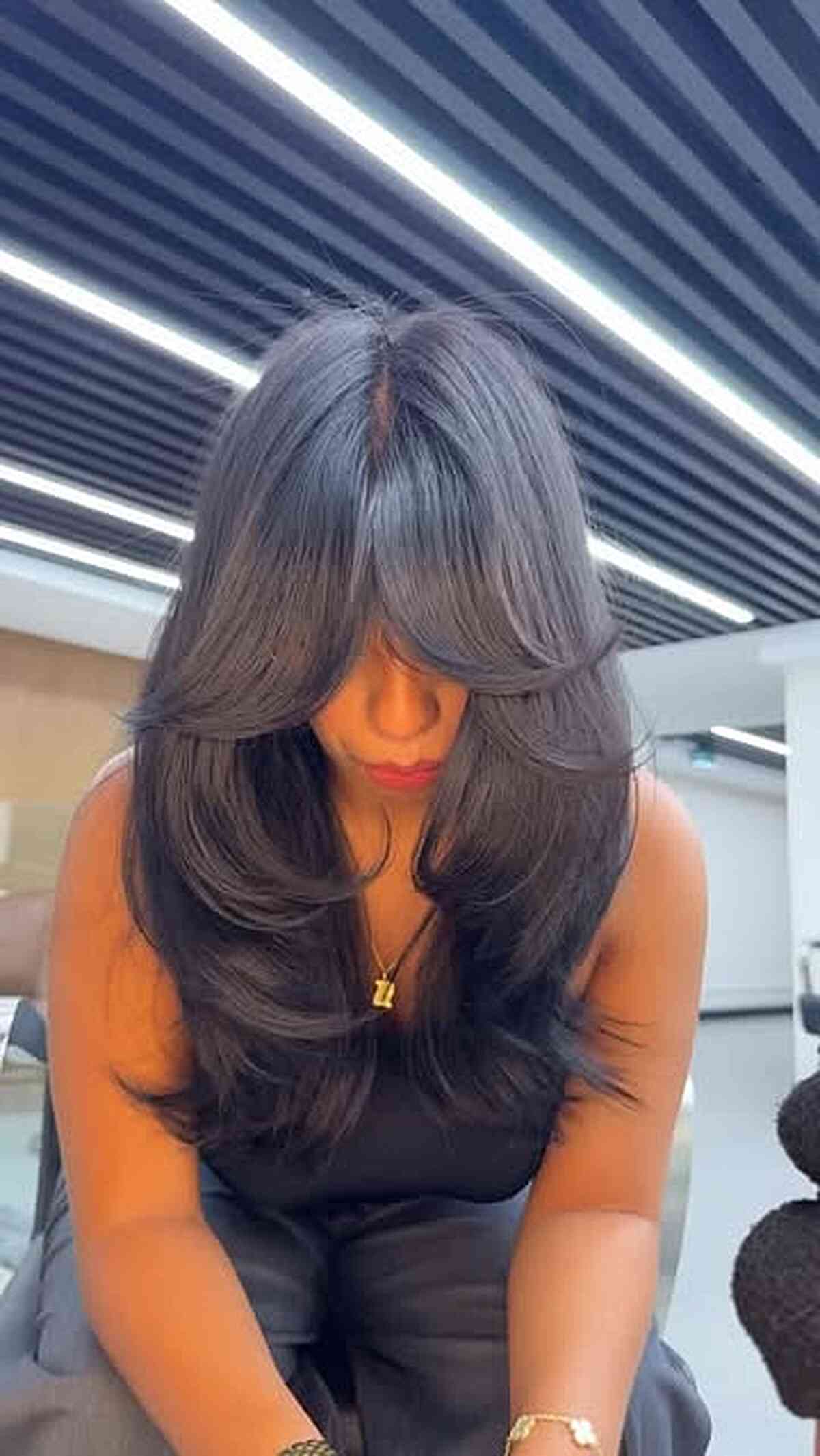 Long Layered Hairstyles with Curtain Bangs: Trends & Styling Tips for 2026