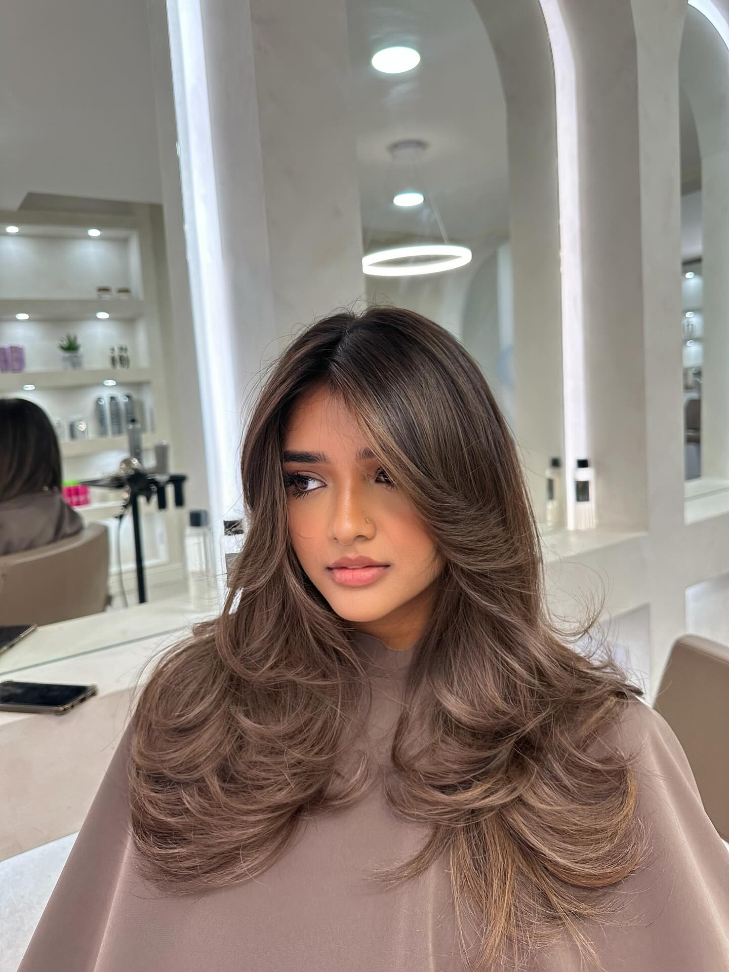 Long Layered Hairstyles with Curtain Bangs: Trends & Styling Tips for 2026