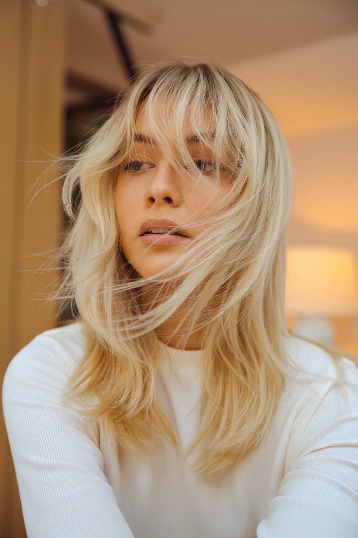 Best Bangs for Blonde Hair in 2026: Styles & Maintenance