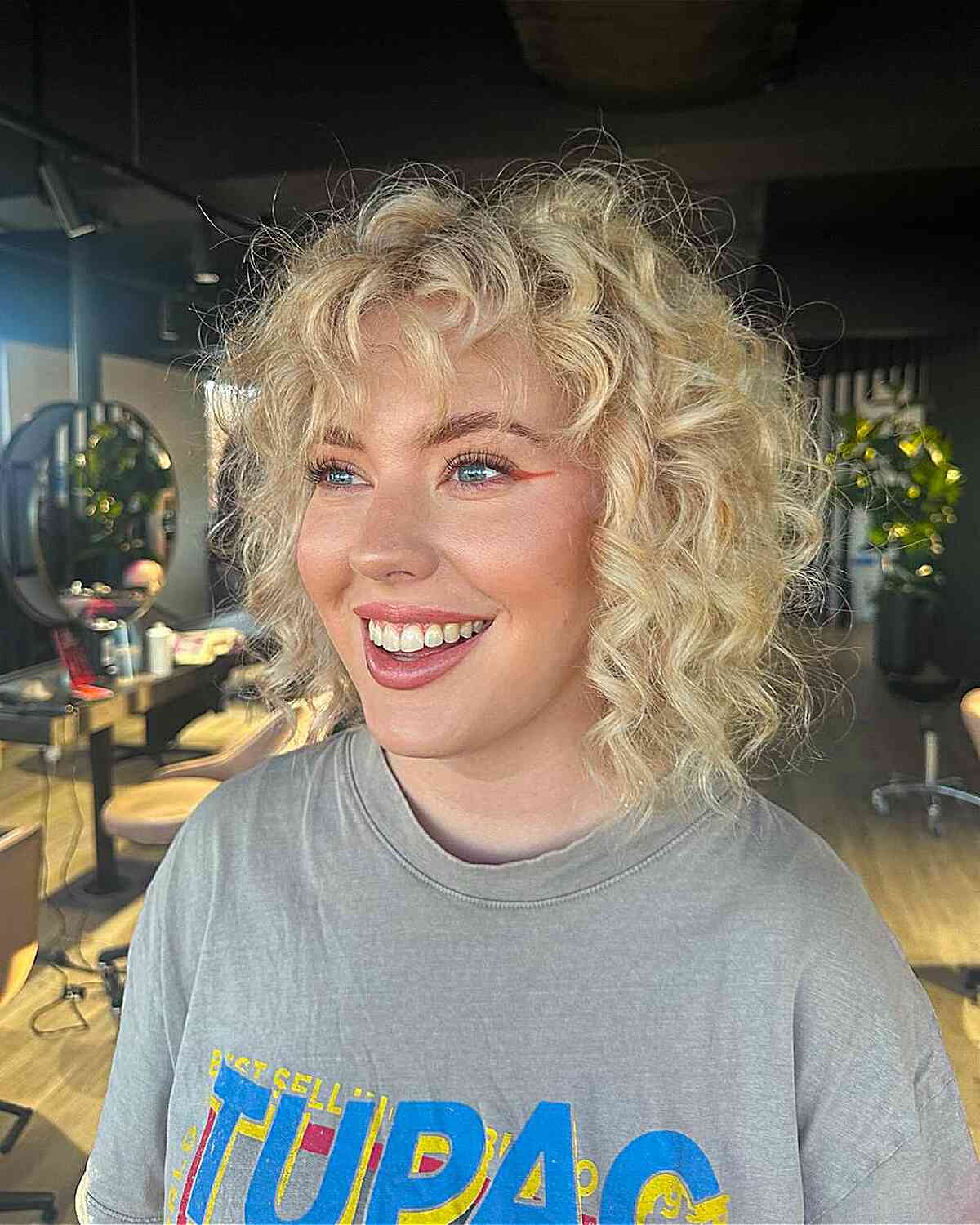 Curly Bob with Bangs: Styles & How to Choose the Best Cut for You