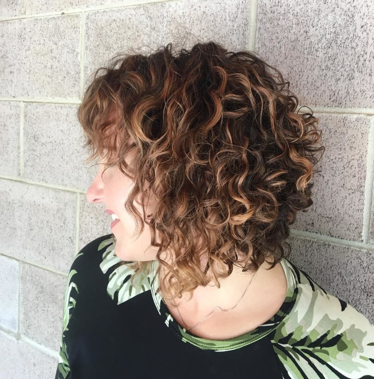 Curly Bob with Bangs: Styles & How to Choose the Best Cut for You