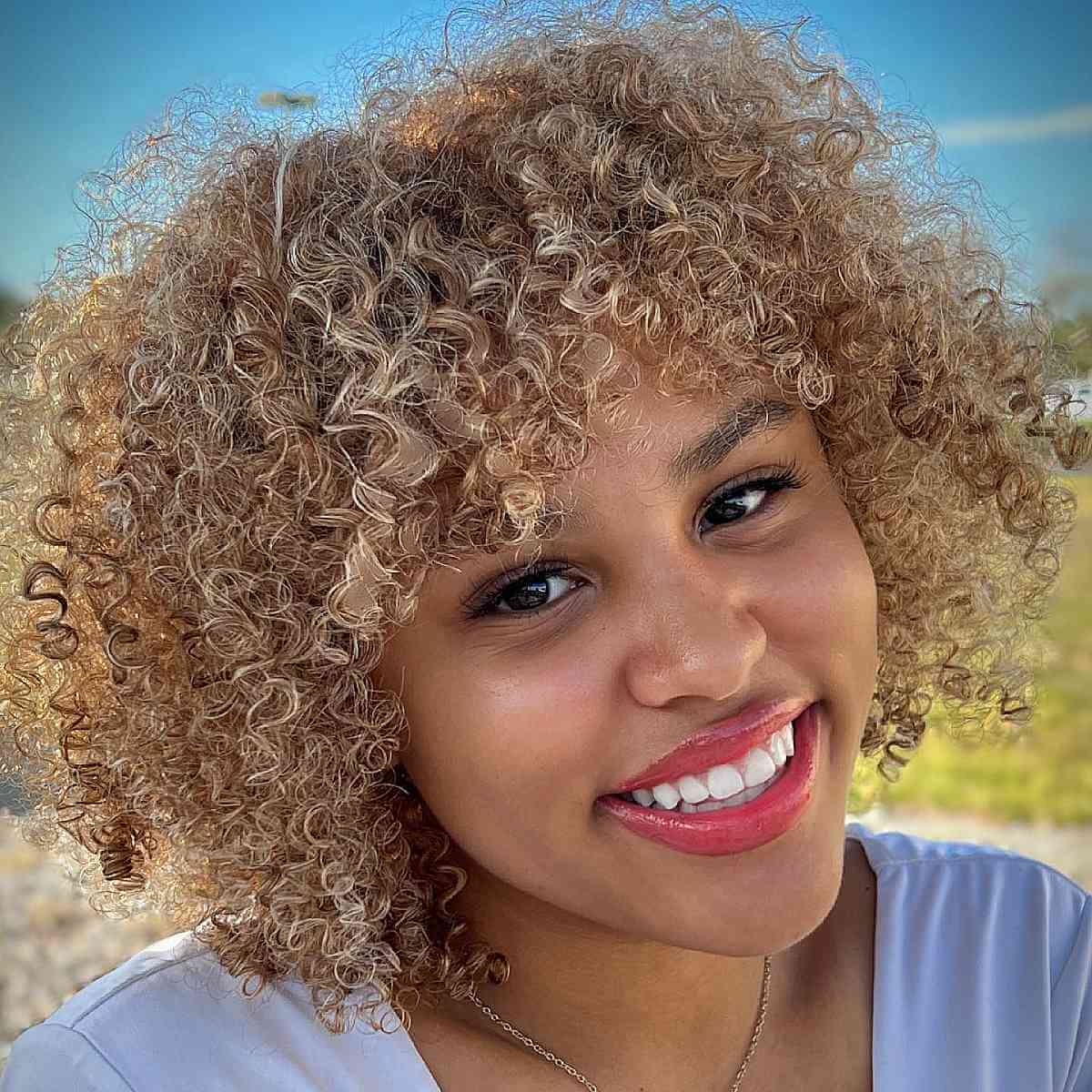 Curly Bob with Bangs: Styles & How to Choose the Best Cut for You