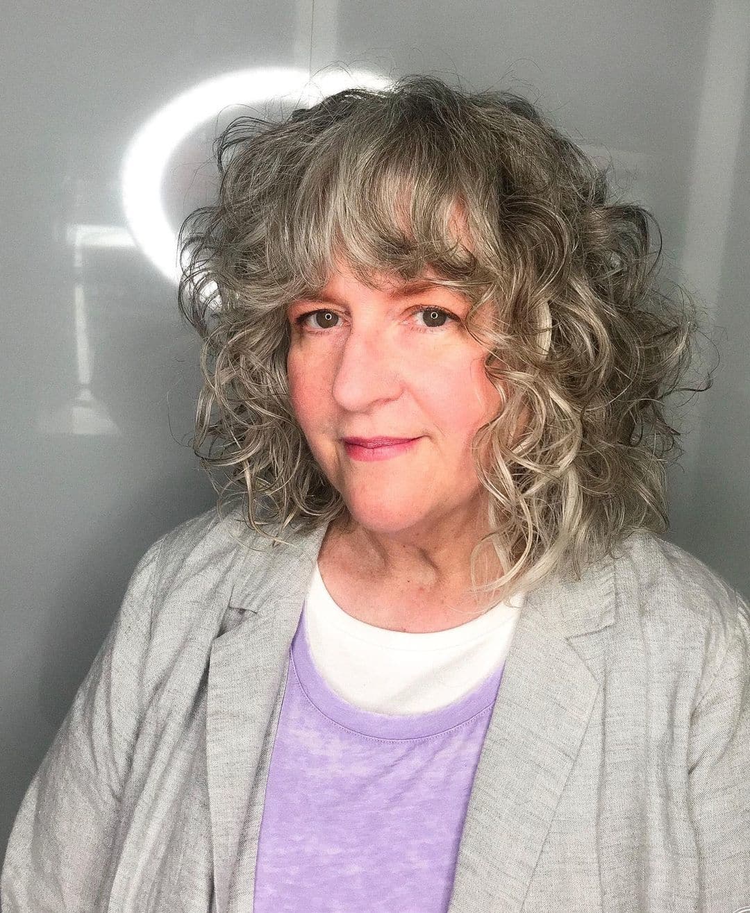 Curly Bob with Bangs: Styles & How to Choose the Best Cut for You