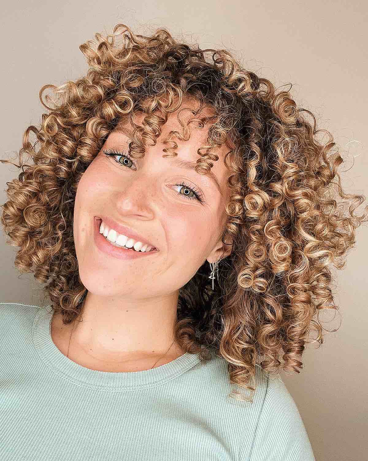 Curly Bob with Bangs: Styles & How to Choose the Best Cut for You