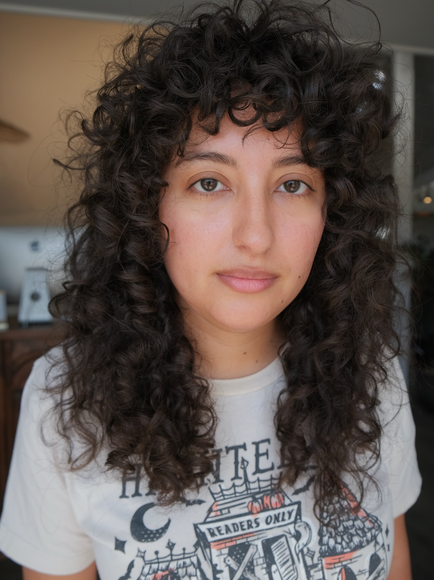 Curly Shag Haircuts with Bangs: Trends & Styling Tips for 2026