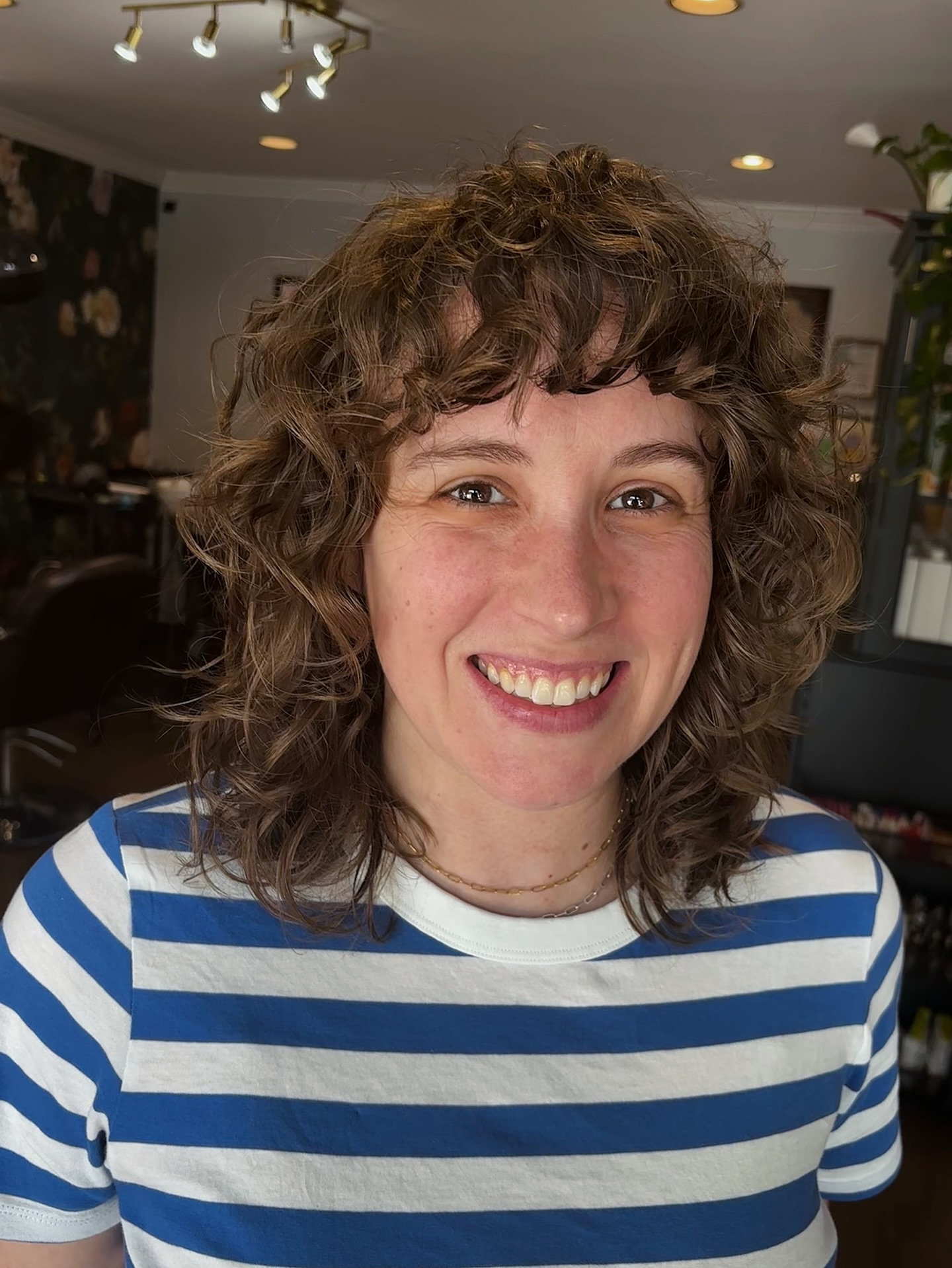 Curly Shag Haircuts with Bangs: Trends & Styling Tips for 2026