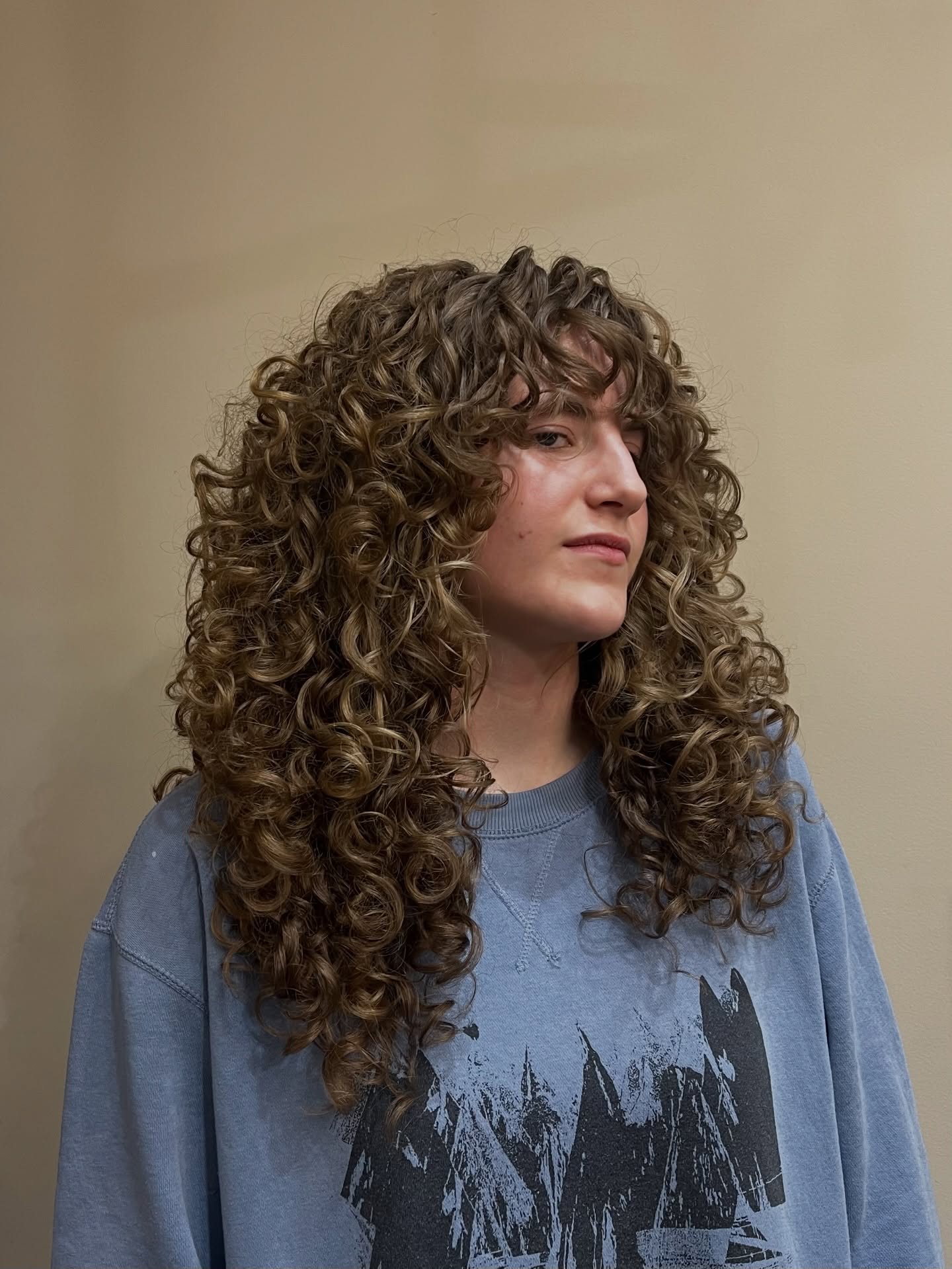 Curly Shag Haircuts with Bangs: Trends & Styling Tips for 2026