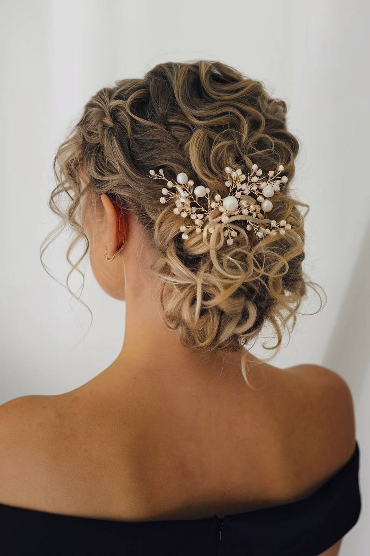 2026 Curly Hair Bun Styles: Effortless & Chic | [Your Brand Name]