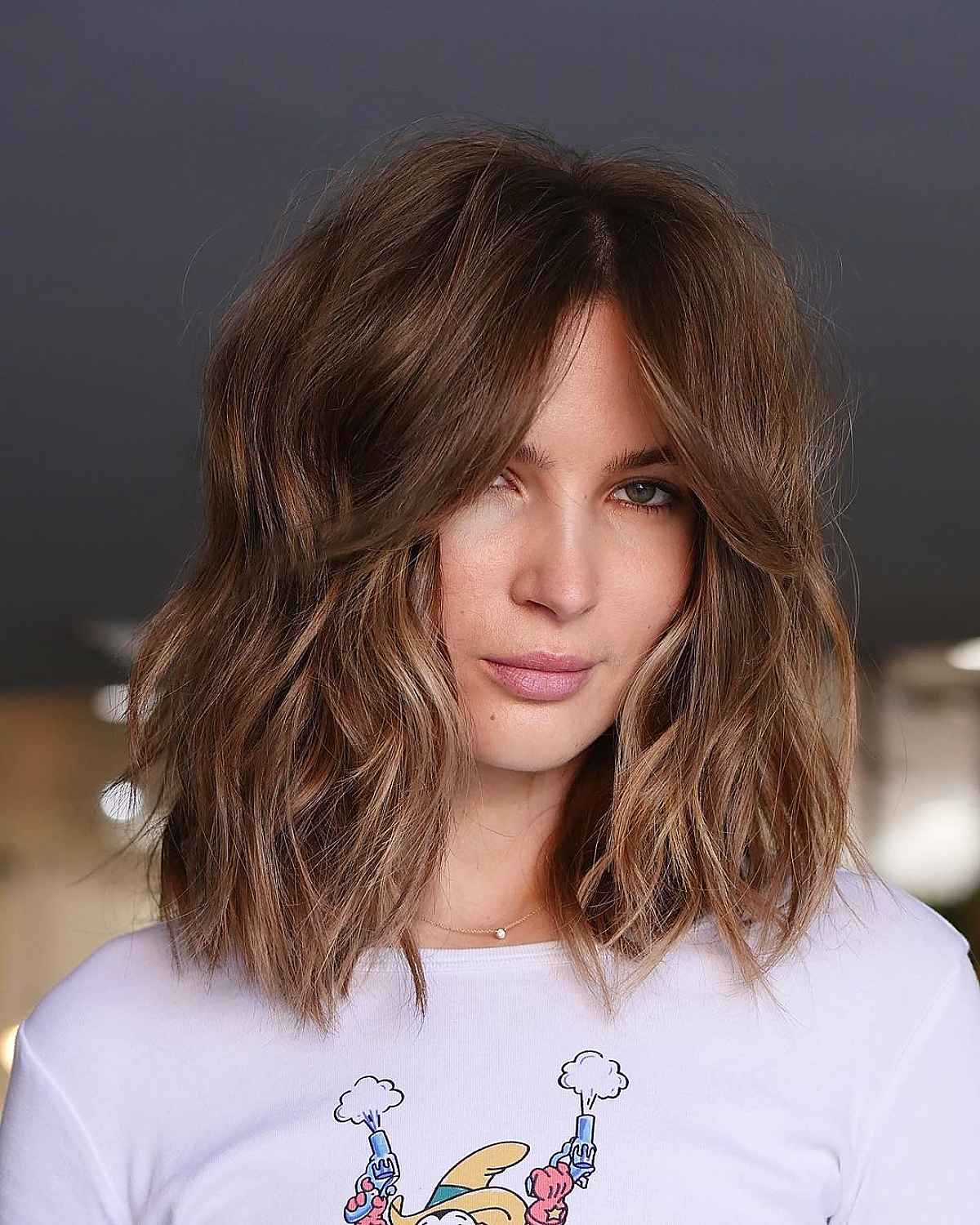 Curtain Bangs & Wavy Hair: 29 Styling Ideas & Expert Tips