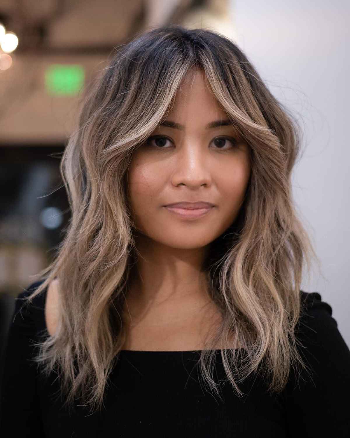 Curtain Bangs & Wavy Hair: 29 Styling Ideas & Expert Tips