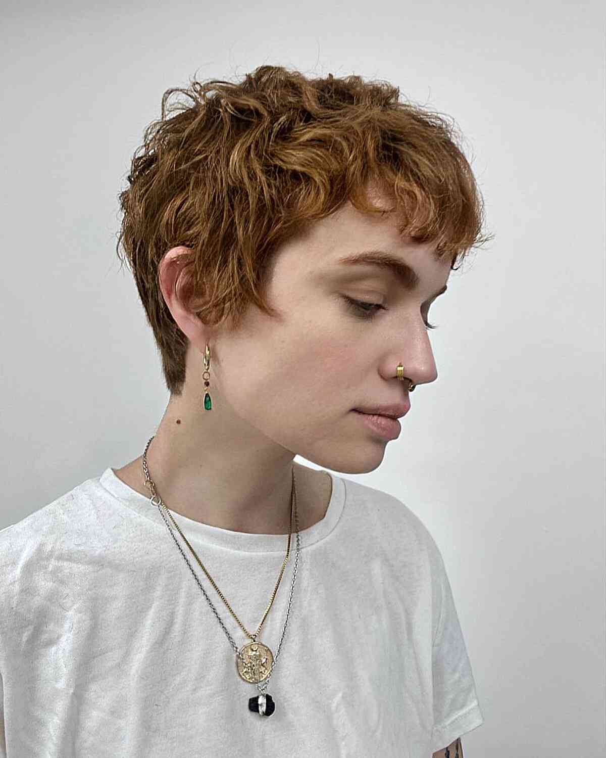 25 coupes Pixie tendance des années 90 :des styles pour chaque forme de visage