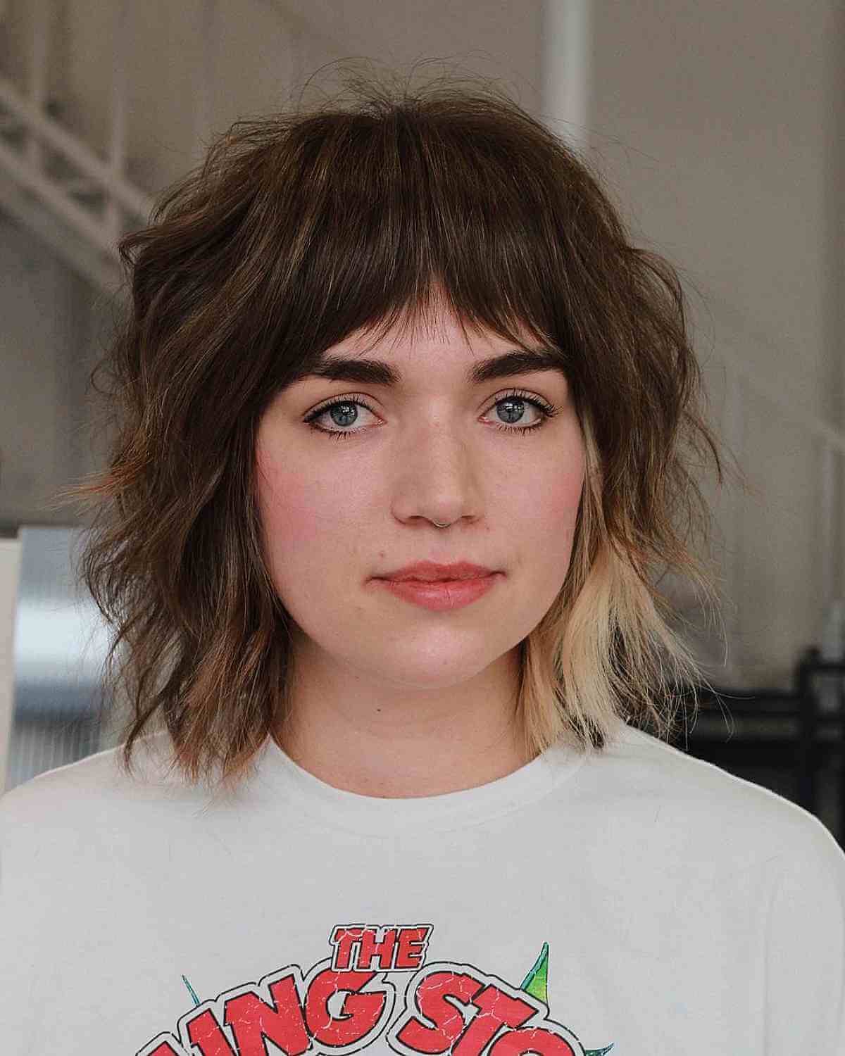 Coupes de cheveux courtes à poils longs avec frange :styles et conseils nécessitant peu d entretien