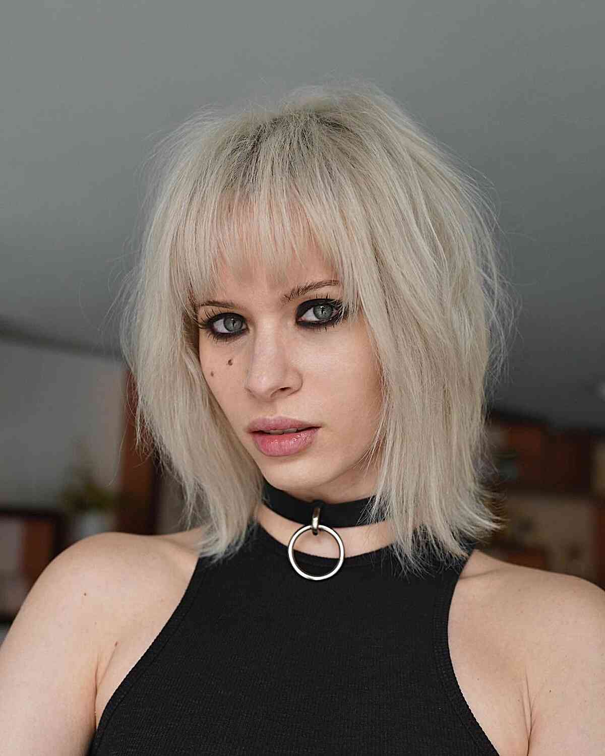 Os melhores cortes de cabelo acima dos ombros:estilos e dicas para o seu comprimento 