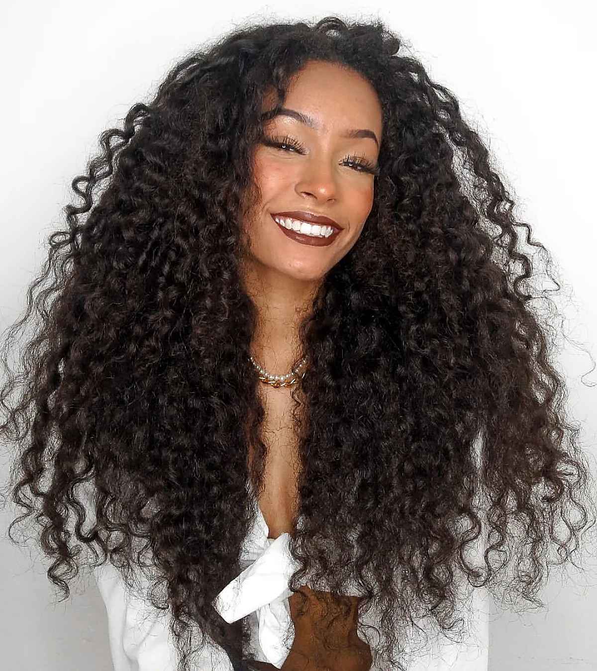 Coupes de cheveux longues et bouclées :51 idées époustouflantes et conseils de style