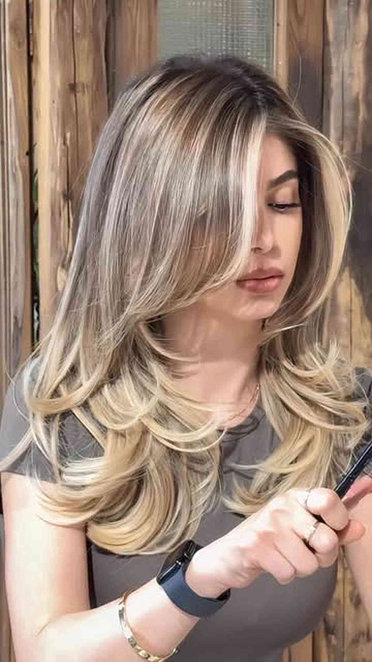 Strati per incorniciare il viso per capelli lunghi:47 stili e consigli degli esperti