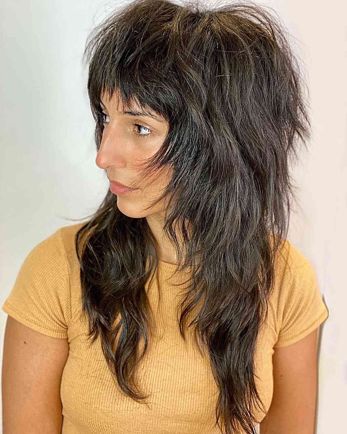 Coiffures longues et hirsutes pour cheveux épais :33 idées élégantes