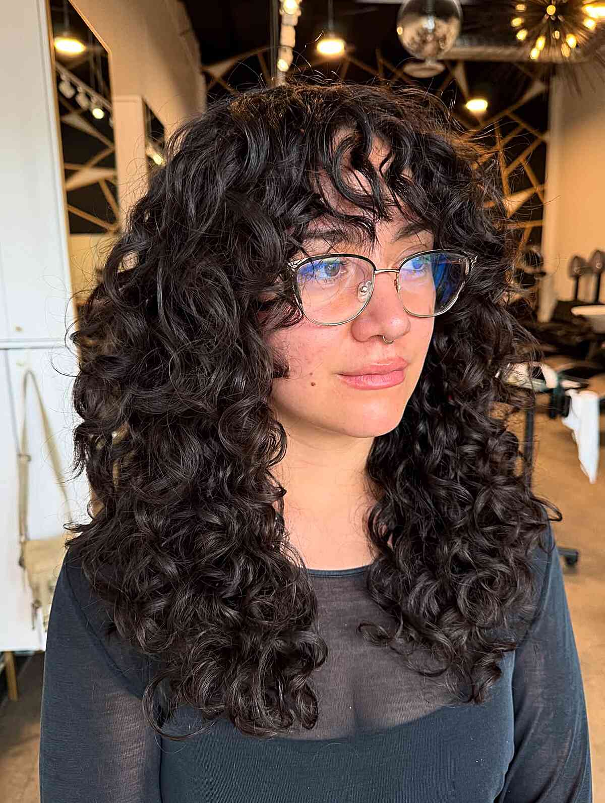 Coupe de cheveux longue et bouclée :24 conseils de style et inspiration