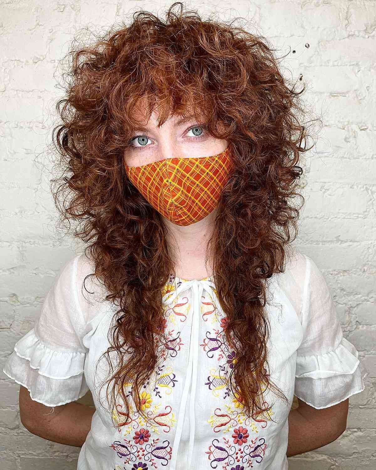 Coupe de cheveux longue et bouclée :24 conseils de style et inspiration