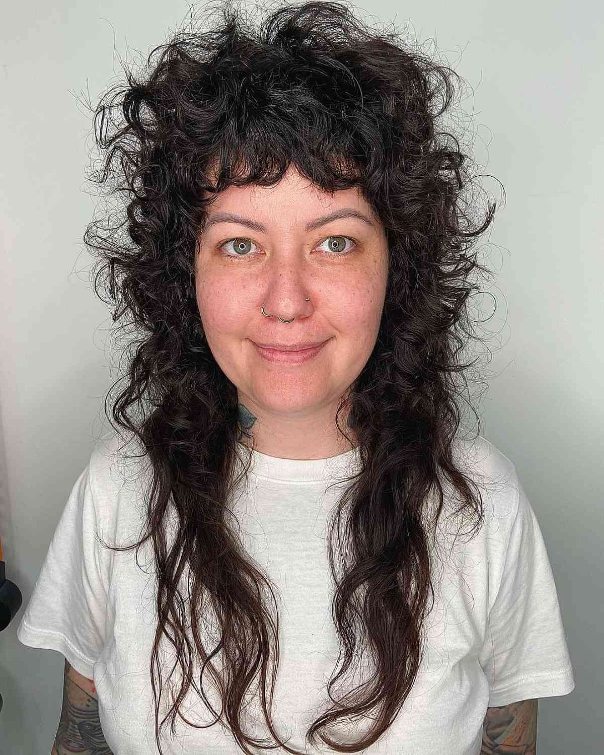 Coupe de cheveux longue et bouclée :24 conseils de style et inspiration