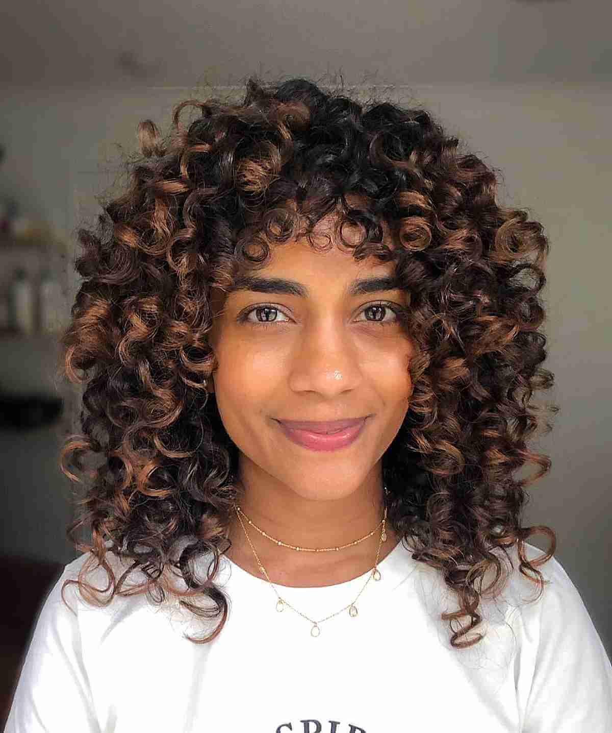 Balayage pour cheveux bouclés :guide et conseils du professionnel