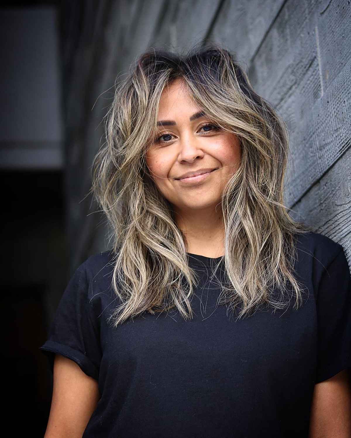 Franges de rideaux et cheveux ondulés :29 idées de coiffure et conseils d experts